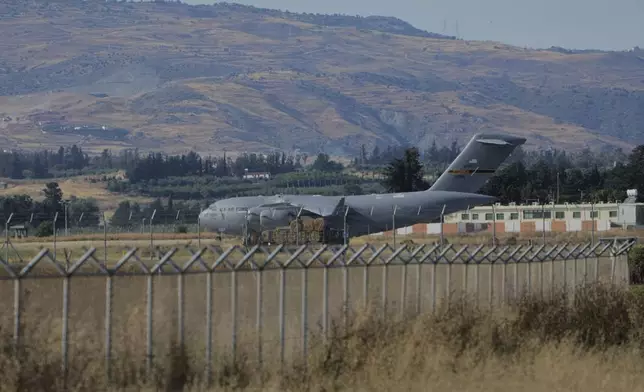 A US Air Force C-17 Globemaster transport aircraft sits on the tarmac of Andreas Papandreou Air Force Base in Paphos, Cyprus, Wednesday, June 18, 2025. (AP Photo/Petros Karadjias)