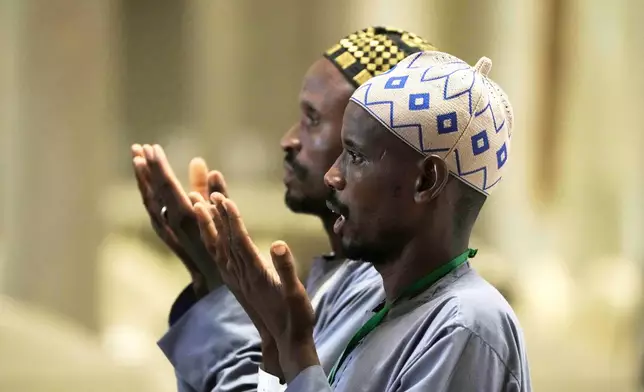 Muslim pilgrims pray at the Grand Mosque during the annual Hajj pilgrimage in Mecca, Saudi Arabia, Tuesday, June 3, 2025. (AP Photo/Amr Nabil)