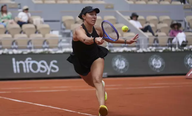 Jessica Pegula of the U.S. plays a shot against France's Lois Boisson during their fourth round match of the French Tennis Open at the Roland-Garros stadium in Paris, Monday, June 2, 2025. (AP Photo/Thibault Camus)