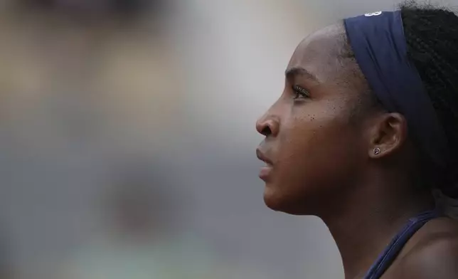 Coco Gauff of the U.S. eyes the ball as she plays a shot against Russia's Ekaterina Alexandrova during their fourth round match of the French Tennis Open at the Roland-Garros stadium in Paris, Monday, June 2, 2025. (AP Photo/Thibault Camus)
