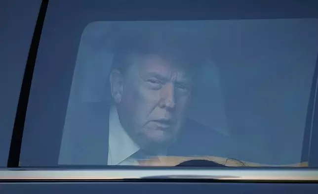 President Donald Trump arrives for a formal dinner at the Paleis Huis ten Bosch ahead of the NATO summit in The Hague, Netherlands, Tuesday, June 24, 2025. (AP Photo/Markus Schreiber)