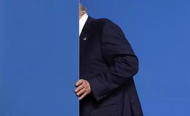 President Donald Trump leaves after a media conference at the end of the NATO summit in The Hague, Netherlands, Wednesday, June 25, 2025. (AP Photo/Alex Brandon)