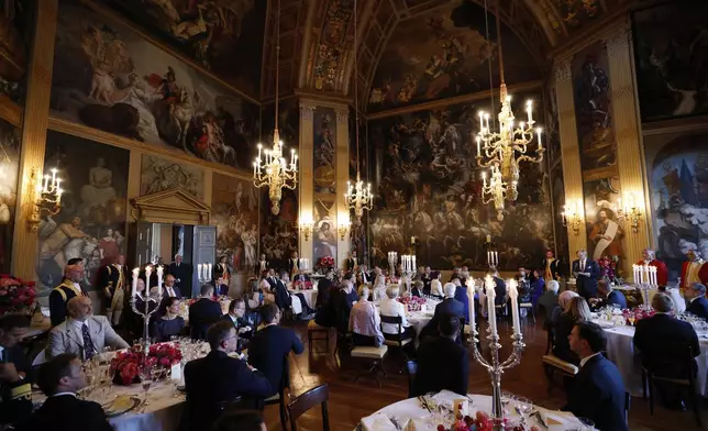 NATO heads of state and government attend a dinner with Netherland's King Willem Alexander and Queen Maxima at the Paleis Huis ten Bosch ahead of the NATO summit in The Hague, Netherlands, Tuesday, June 24, 2025. (Remko de Waal, Pool Photo via AP)