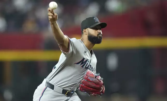 Miami Marlins starting pitcher Sandy Alcantara throws against the Arizona Diamondbacks during the first inning of a baseball game Saturday, June 28, 2025, in Phoenix. (AP Photo/Ross D. Franklin)