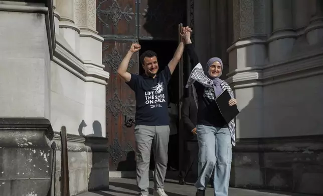 Pro-Palestinian activist Mahmoud Khalil and his wife, Dr. Noor Abdalla, greet supporters after his release from immigration detention at a rally, Sunday, June 22, 2025, in New York. (AP Photo/Olga Fedorova)