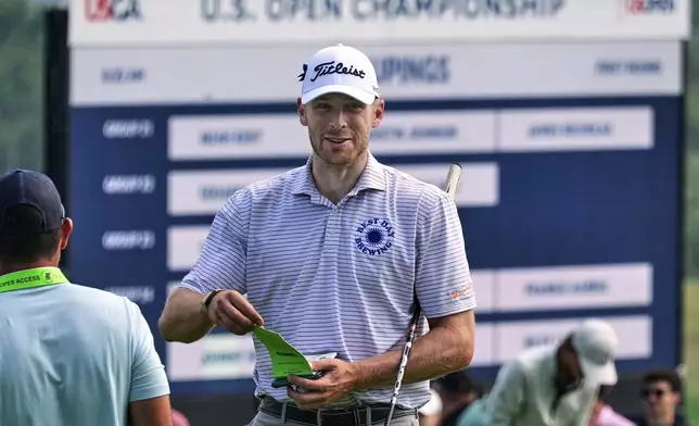 Matt Vogt works on the practice green before a practice round for the 2025 US Open golf championship at Oakmont Country Club in Oakmont, Pa. Monday, June 9, 2025. (AP Photo/Gene J. Puskar)