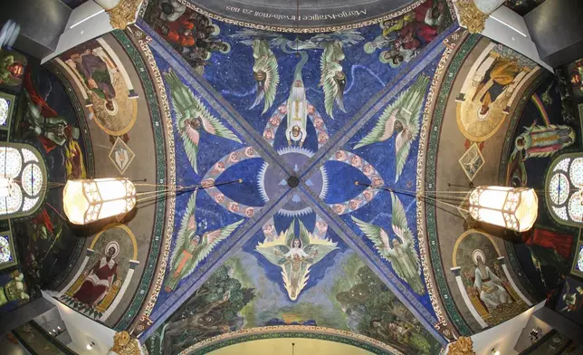 A mural by Croatian-American artist Maxo Vanka titled "Transcendent Vision (including Disciples)" is seen in St. Nicholas Croatian Catholic Church after undergoing preservation efforts in Millvale, Pa., Wednesday, May 28, 2025. (AP Photo/Gene J. Puskar)