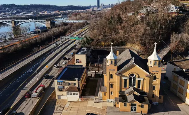 St. Nicholas Croatian Catholic Church, home to murals by Maxo Vanka, sits next to the Allegheny River in Millvale, Pa., Feb 13, 2025. (AP Photo/Gene J. Puskar)
