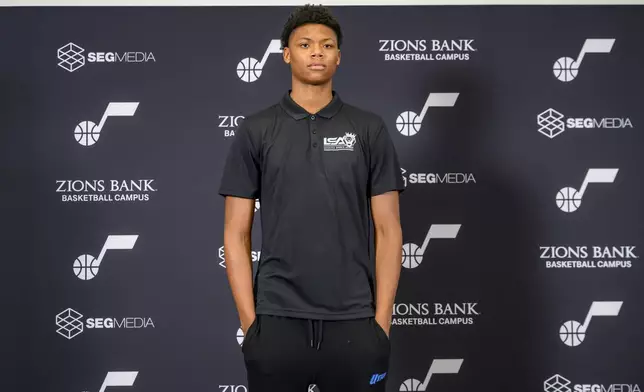 Utah Jazz first round fifth overall draft pick Ace Bailey poses during the Utah Jazz player introduction press conference, Sunday, June 29, 2025, in Salt Lake City. (AP Photo/Tyler Tate)