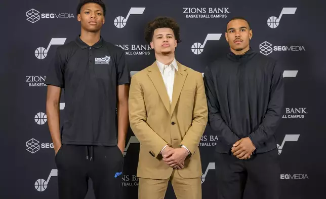 Utah Jazz drafted players, left to right, Ace Bailey, Walter Clayton Jr. and John Tonje pose during the Utah Jazz player introduction press conference, Sunday, June 29, 2025, in Salt Lake City. (AP Photo/Tyler Tate)