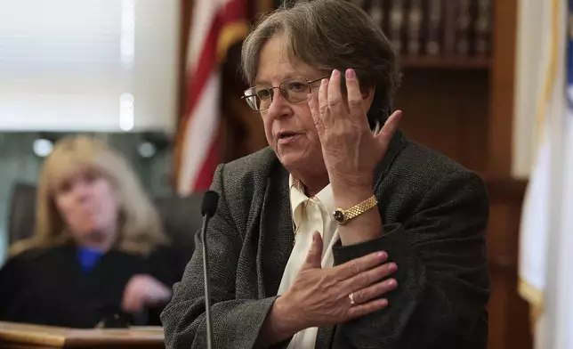 Forensic pathologist Dr. Marie Russell testifies about the type of injuries to the back of someone's arm during the murder retrial of Karen Read in Norfolk Superior Court, Monday June 2, 2025, in Dedham, Mass. (Pat Greenhouse/The Boston Globe via AP, Pool)