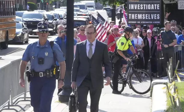 Prosecutor Hank Brennan arrives at Norfolk Superior Court during the Karen Read trial, Monday, June 16, 2025, in Dedham, Mass. (AP Photo/Charles Krupa)