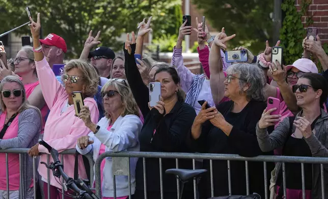 Supporters signal to Karen Read, as the jury deliberates at Read's trial, outside Norfolk Superior Court, Monday, June 16, 2025, in Dedham, Mass. (AP Photo/Charles Krupa)