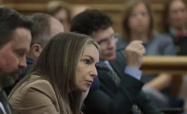 Dedham, MA June 9 Karen Read listens to the testimony of expert Daniel Wolfe, when he returns to the stand in her murder retrial in Norfolk Superior Court, Monday June 9, 2025, in Dedham, Mass. (Pat Greenhouse/The Boston Globe via AP, Pool)