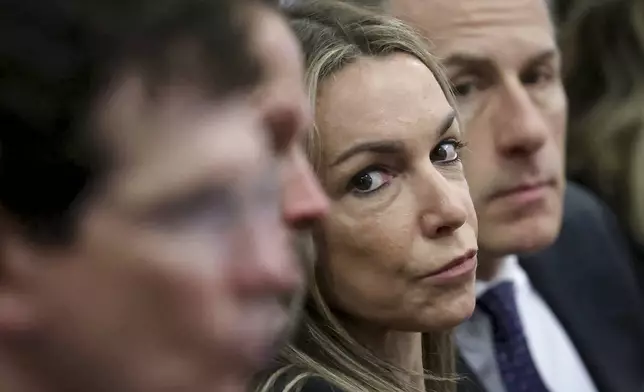 Defendant Karen Read sits with her defense team including David Yannetti, right, during closing arguments in her murder trial in Norfolk Superior Court, Friday, June 13, 2025, in Dedham, Mass. (Mark Stockwell/The Sun Chronicle via AP, Pool)