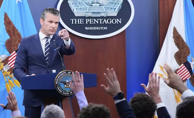 Defense Secretary Pete Hegseth calls on reporters for questions during a news conference at the Pentagon in Washington, Sunday, June 22, 2025, after the U.S. military struck three sites in Iran, directly joining Israel's effort to destroy the country's nuclear program. (AP Photo/Alex Brandon)