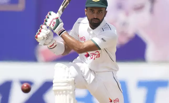 Bangladesh's Shadman Islam plays a shot during the first day of the first cricket test match between Sri Lanka and Bangladesh in Galle, Sri Lanka, Tuesday, June 17, 2025. (AP Photo/Eranga Jayawardena)