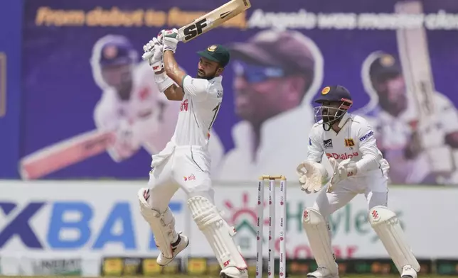 Bangladesh's Shadman Islam plays a shot during the first day of the first cricket test match between Sri Lanka and Bangladesh in Galle, Sri Lanka, Tuesday, June 17, 2025. (AP Photo/Eranga Jayawardena)
