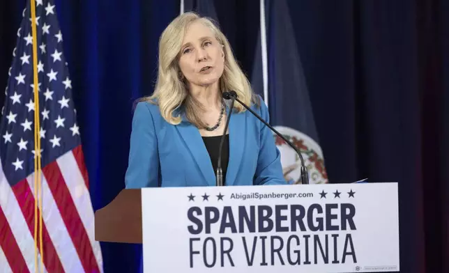 Democratic gubernatorial candidate Abigail Spanberger addresses a crowd at a rally at her alma mater, J.R. Tucker High School, in Henrico, Va., Monday, June 16, 2025. (Mike Kropf /Richmond Times-Dispatch via AP)