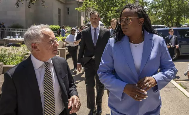 Rep. LaMonica Mclver, right, (D-10th) and attorney Paul Fishman, left, leave a press conference outside a federal court Wednesday, June 25, 2025, in Newark, N.J. (AP Photo/Yuki Iwamura)