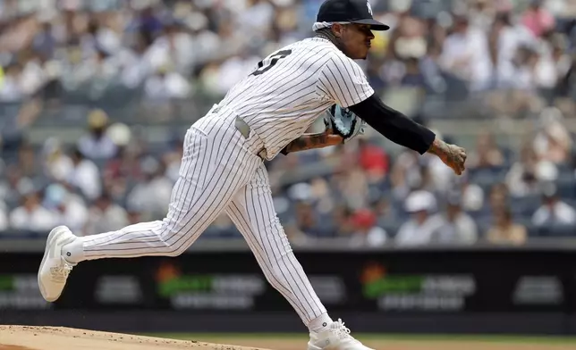 New York Yankees pitcher Marcus Stroman throws during the first inning of a baseball game against the Athletics, Sunday, June 29, 2025, in New York. (AP Photo/Adam Hunger)