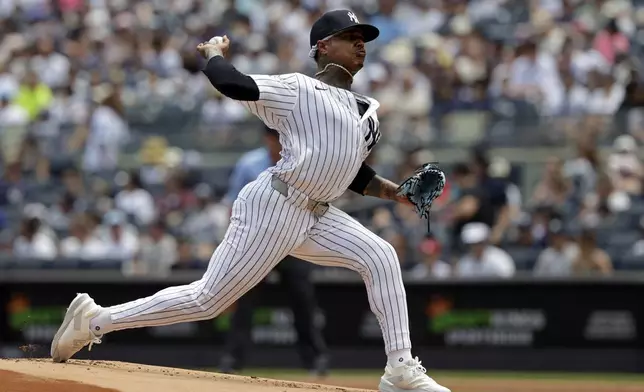 New York Yankees pitcher Marcus Stroman throws during the first inning of a baseball game against the Athletics, Sunday, June 29, 2025, in New York. (AP Photo/Adam Hunger)