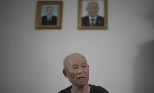 Lee Seon-wu, 94, a former South Korean soldier, lost three fingers and was captured by Chinese troops during a fierce battle in the eastern Gangwon province in the final days of the Korean War, speaks during an interview at his home in Gimpo, South Korea, on June 20, 2025. (AP Photo/Lee Jin-man)