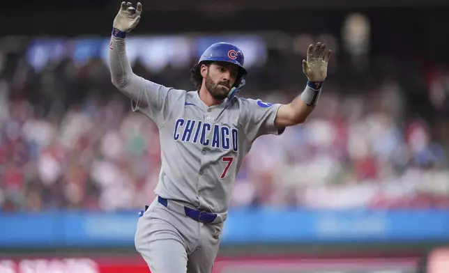 Chicago Cubs' Dansby Swanson reacts after hitting a home run against Philadelphia Phillies pitcher Mick Abel during the second inning of a baseball game Tuesday, June 10, 2025, in Philadelphia. (AP Photo/Matt Slocum)