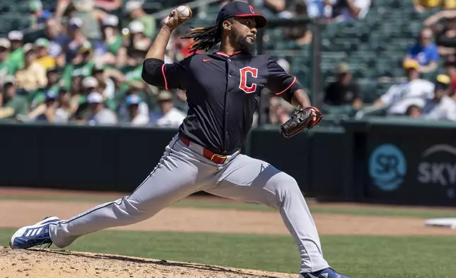 Cleveland Guardians pitcher Emmanuel Clase throws to the Athletics during the ninth inning of a baseball game Sunday, June 22, 2025, in West Sacramento, Calif. (AP Photo/Sara Nevis)