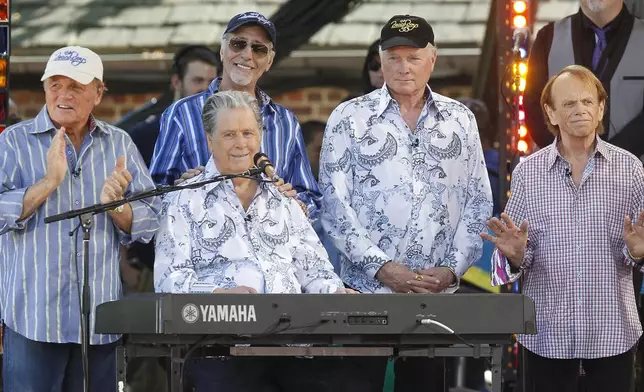 FILE - Members of The Beach Boys, from left, Bruce Johnston, David Marks, rear, Brian Wilson, Mike Love and Al Jardine appear during ABC's "Good Morning America" summer concert series, on June 15, 2012, in New York. (Photo by Jason DeCrow/Invision/AP, File)