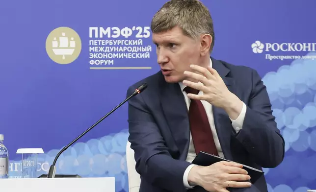 In this photo released by the Roscongress Foundation, Minister of Economic Development of the Russian Federation Maxim Reshetnikov attends a plenary session of the St. Petersburg International Economic Forum in St. Petersburg, Russia, Thursday, June 19, 2025. (Roscongress Foundation via AP)