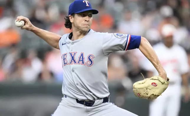 Texas Rangers starting pitcher Jacob deGrom throws during the second inning of a baseball game against the Baltimore Orioles, Wednesday, June 25, 2025, in Baltimore. (AP Photo/Nick Wass)