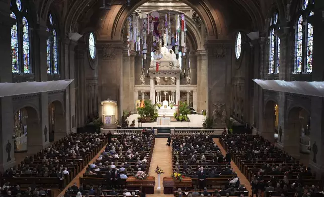 Attendees take their seats before funeral services for Mark and Melissa Hortman at the Basilica of St. Mary in Minneapolis, Minn., on Saturday, June 28, 2025. (Jeff Wheeler/Star Tribune via AP, Pool)
