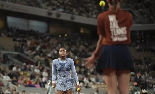 Coco Gauff of the U.S. prepares to serve against Madison Keys of the U.S. during their quarterfinal match of the French Tennis Open at the Roland-Garros stadium in Paris, Wednesday, June 4, 2025. (AP Photo/Christophe Ena)