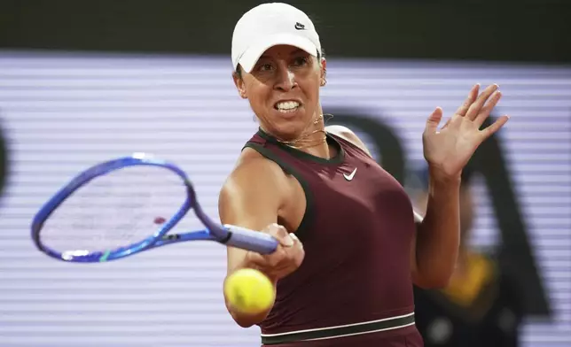 Madison Keys of the U.S. plays a shot against Coco Gauff of the U.S. during their quarterfinal match of the French Tennis Open at the Roland-Garros stadium in Paris, Wednesday, June 4, 2025. (AP Photo/Christophe Ena)