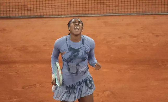 Coco Gauff of the U.S. celebrates as she won the quarterfinal match of the French Tennis Open against Madison Keys of the U.S. at the Roland-Garros stadium in Paris, Wednesday, June 4, 2025. (AP Photo/Christophe Ena)