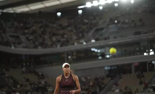 Madison Keys of the U.S. walks during the quarterfinal match of the French Tennis Open against Coco Gauff of the U.S. at the Roland-Garros stadium in Paris, Wednesday, June 4, 2025. (AP Photo/Christophe Ena)