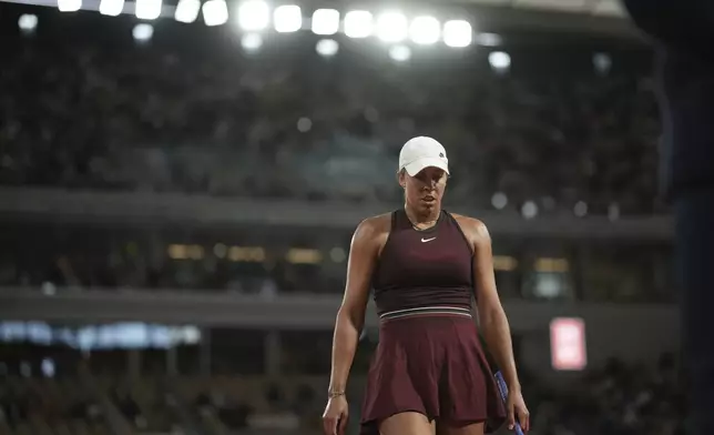 Madison Keys of the U.S. walks during the quarterfinal match of the French Tennis Open against Coco Gauff of the U.S. at the Roland-Garros stadium in Paris, Wednesday, June 4, 2025. (AP Photo/Christophe Ena)