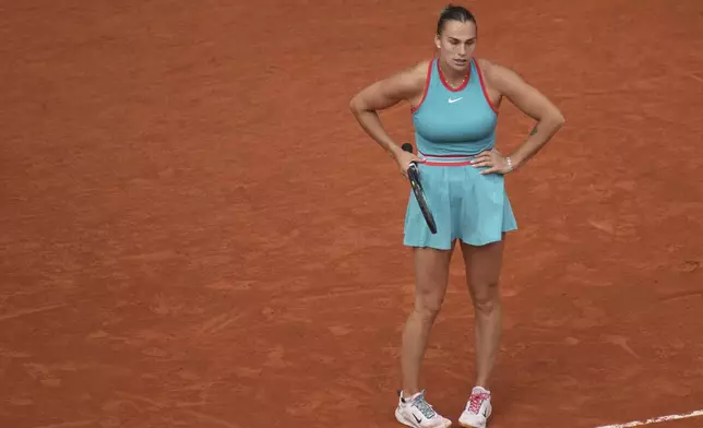 Aryna Sabalenka of Belarus reacts as she plays against Coco Gauff of the U.S. during their final match of the French Tennis Open at the Roland-Garros stadium in Paris, Saturday, June 7, 2025. (AP Photo/Christophe Ena)