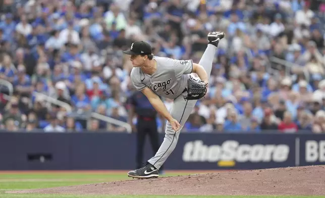 Chicago White Sox pitcher Grant Taylor works against the Toronto Blue Jays during first-inning baseball game action in Toronto, Friday June 20, 2025. (Chris Young/The Canadian Press via AP)
