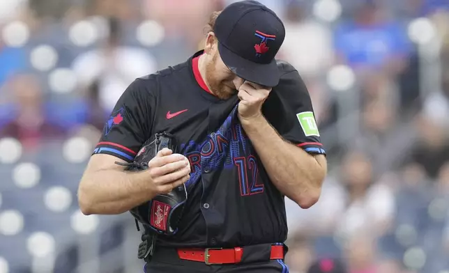 Toronto Blue Jays pitcher Spencer Turnbull reacts during second-inning baseball game action against the Chicago White Sox in Toronto, Friday June 20, 2025. (Chris Young/The Canadian Press via AP)