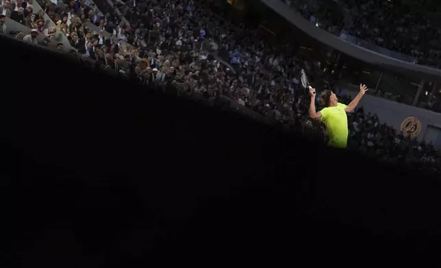 Germany's Alexander Zverev plays a shot against Serbia's Novak Djokovic during their quarterfinal match of the French Tennis Open at the Roland-Garros stadium in Paris, Wednesday, June 4, 2025. (AP Photo/Lindsey Wasson)