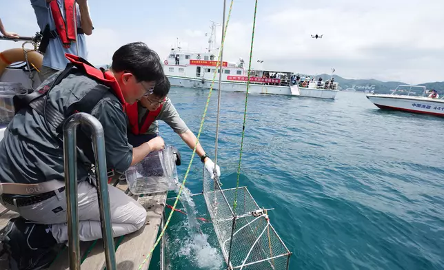 Fish restocking exercise held on National Fish Releasing Day 2025  Source: HKSAR Government Press Releases