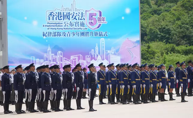 Security Bureau holds Flag Raising Ceremony by Disciplined Services and Youth Groups for Commemorating 5th Anniversary of Promulgation and Implementation of Hong Kong National Security Law (with photos/video) Source: HKSAR Government Press Releases