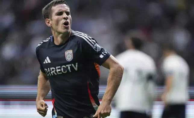 San Diego FC's Milan Iloski celebrates his third goal against the Vancouver Whitecaps during the first half of an MLS soccer match in Vancouver, British Columbia, Wednesday, June 25, 2025. (Darryl Dyck/The Canadian Press via AP)