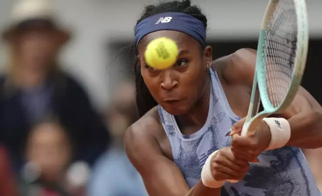 Coco Gauff of the U.S. plays a shot against Aryna Sabalenka of Belarus during their final match of the French Tennis Open at the Roland-Garros stadium in Paris, Saturday, June 7, 2025. (AP Photo/Aurelien Morissard)