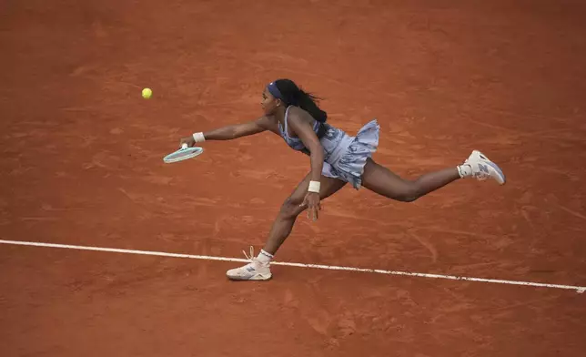 Coco Gauff of the U.S. plays a shot against Aryna Sabalenka of Belarus during their final match of the French Tennis Open at the Roland-Garros stadium in Paris, Saturday, June 7, 2025. (AP Photo/Christophe Ena)