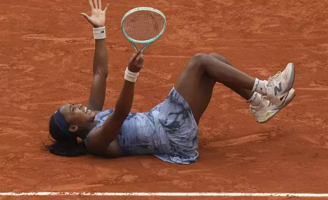 United States' Coco Gauff celebrate after winning the final match of the French Tennis Open at the Roland-Garros against Aryna Sabalenka of Belarus n Paris, Saturday, June 7, 2025. (AP Photo/Thibault Camus)