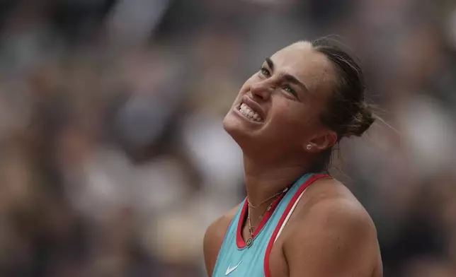 Aryna Sabalenka of Belarus reacts as she plays against Coco Gauff of the U.S. during their final match of the French Tennis Open at the Roland-Garros stadium in Paris, Saturday, June 7, 2025. (AP Photo/Christophe Ena)