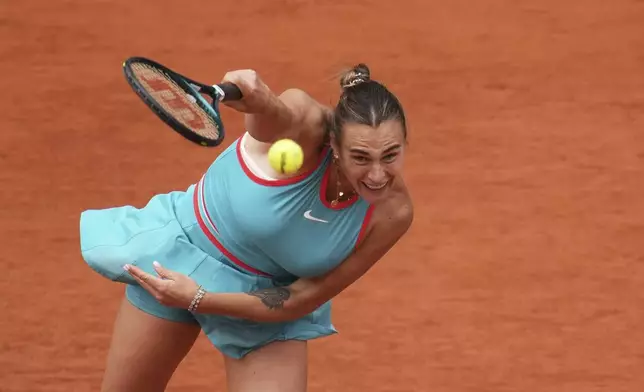 Aryna Sabalenka of Belarus serves against Coco Gauff of the U.S. during their final match of the French Tennis Open at the Roland-Garros stadium in Paris, Saturday, June 7, 2025. (AP Photo/Christophe Ena)